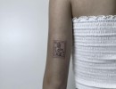 minimalistyczny tatuaz znaczka